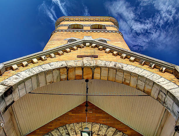 istock Looking Up At a Brick Church Steeple 509176930
