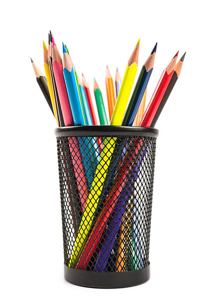 istock Color pencil in a metal container isolated on white background 509177110
