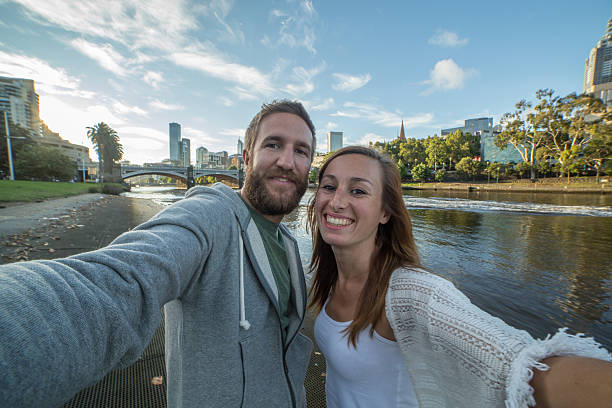 istock Cheerful young couple in Melbourne take a selfie portrait 509177530