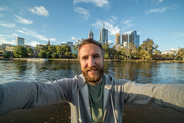 istock One young bearded man takes selfie portrait in Melbourne 509178188