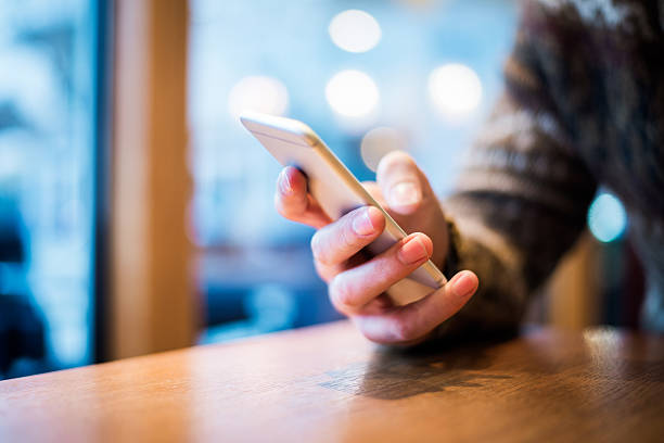 istock Close up of man with mobile phone 509178470