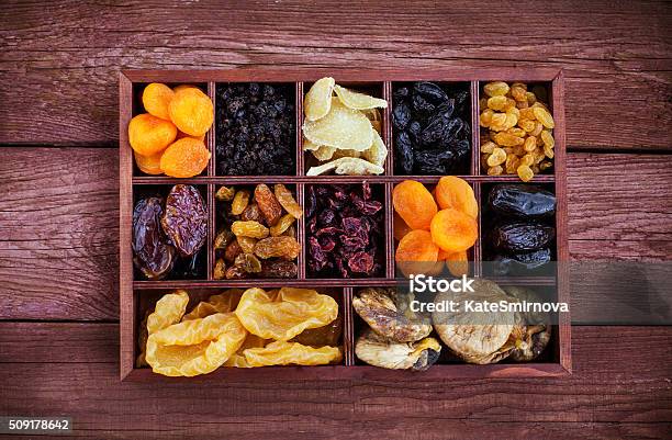 Assorted Dried Fruits In Wooden Box Stock Photo - Download Image Now - Box - Container, Dry, Fruit