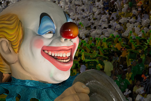 Rio de Janeiro, Brazil - February 08, 2016: Major puppet clown with a smiley face in front of the carnival paraders.