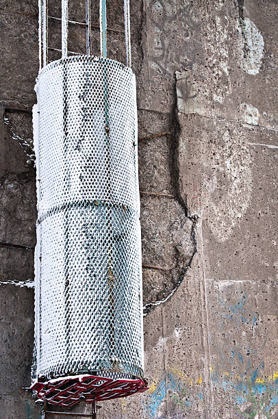 istock Snow covered metal cage under a bridge 509179874