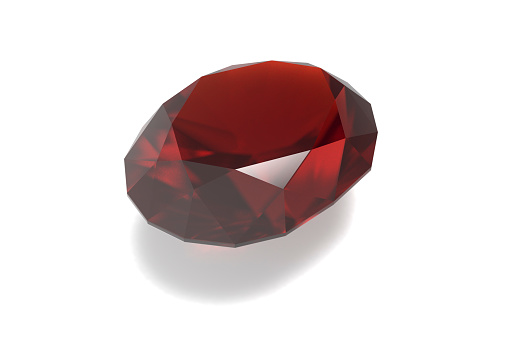 Realistic 3D render of jewel, a dark red garnet gemstone. Isolated on white background.