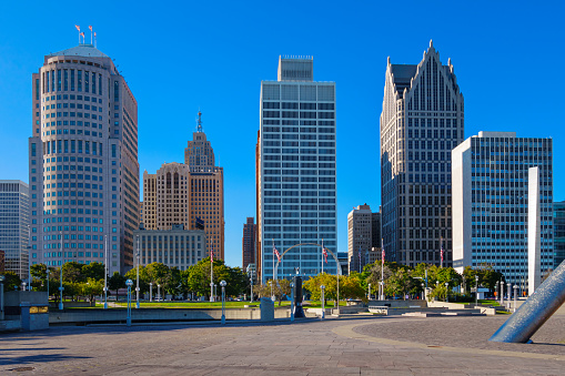 Photo of downtown Detroit, Michigan, USA with office buildings, financial district and park.
