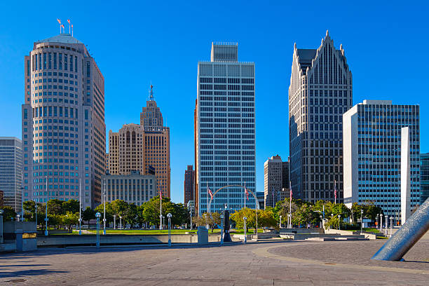 Downtown Detroit Michigan USA Photo of downtown Detroit, Michigan, USA with office buildings, financial district and park. detroit michigan photos stock pictures, royalty-free photos & images