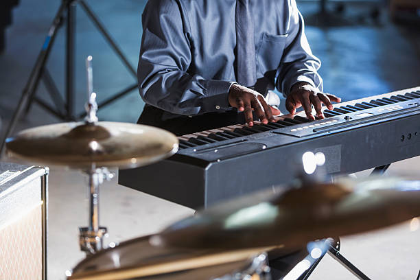 istock Cropped view of man playing keyboard in band 509182004