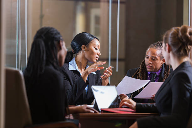 istock Multi-ethnic businesspeople in boardroom meeting 509182250