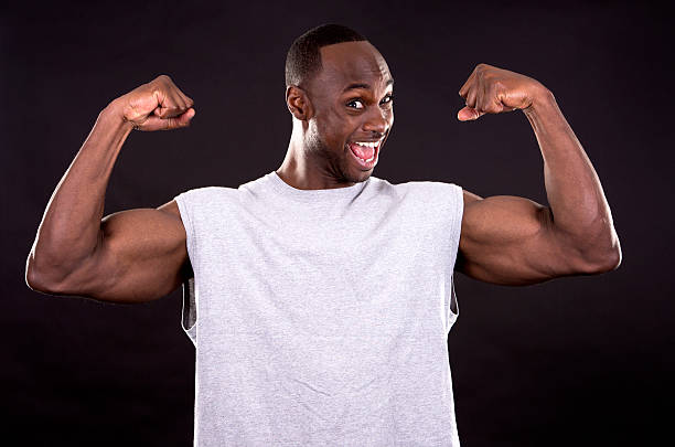 istock fitness man on dark background 509184206