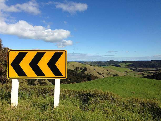 istock Sharp bend road sign in rural New Zealand 509186472
