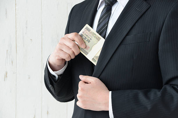 istock Bribe with Japanese money 509188222