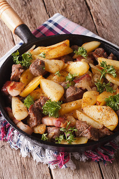 istock country fried potatoes with meat and bacon served in pan 509193722