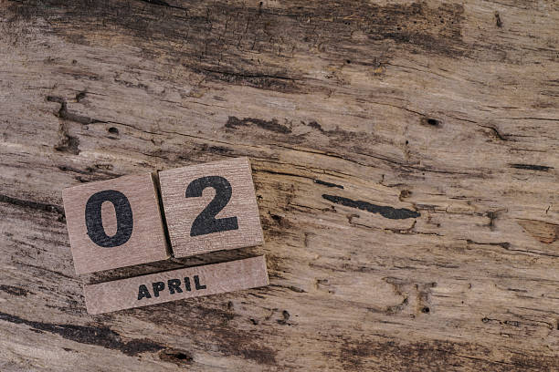 istock cube calendar for april on wooden background 509194144