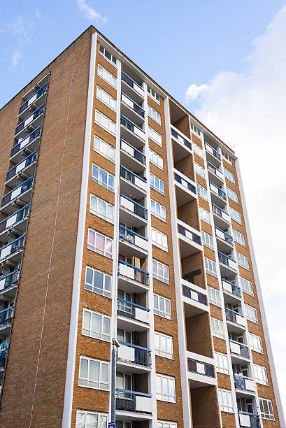 High rise council flat. High rise council flat. A council house is a form of public or social housing built by local municipalities in the United Kingdom and Ireland. brixton photos stock pictures, royalty-free photos & images