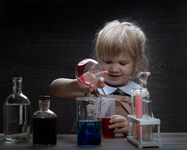 istock Small children spend experiments with chemical glassware and various liquids 509197164