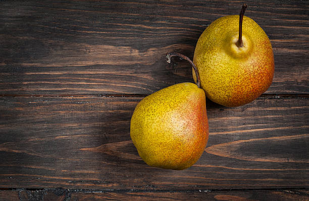 istock Delicious Williams pears on a rustic wooden table 509197616