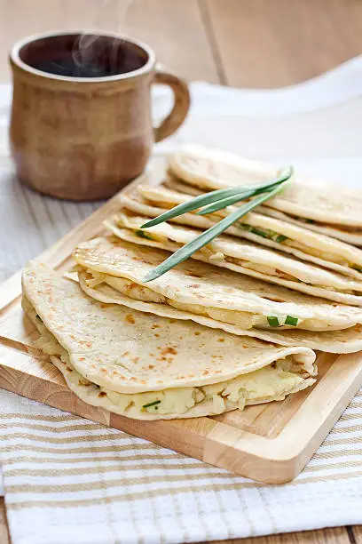 Photo of Flatbread with mashed potato and spring onion