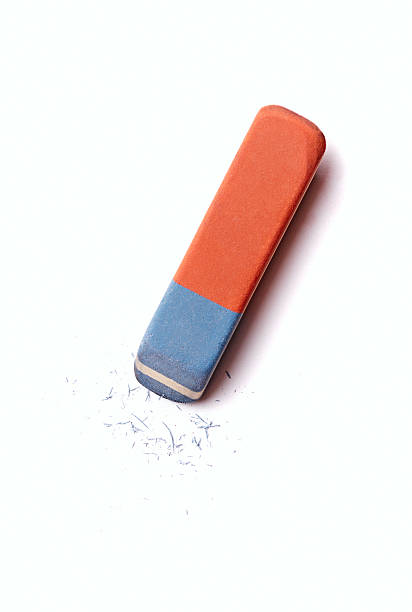 Eraser or rubber with rubber residue on white Blue and red eraser or rubber with rubber residue on white conceptual of school, art and office supplies eraser stock pictures, royalty-free photos & images