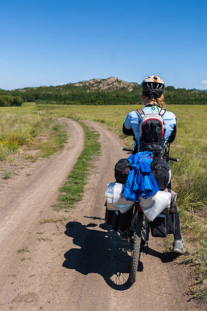istock people travel by bicycle into the wilderness 509208965