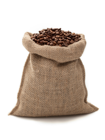Coffee beans in burlap sack isolated on a white background