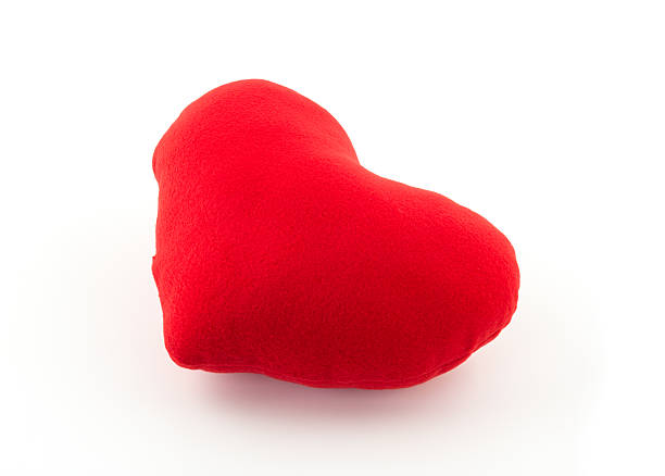 istock red heart pillow on white background 509225158