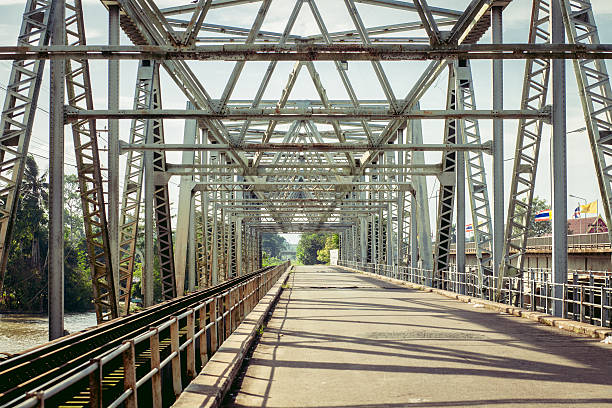 istock Railroad bridge with symmetrical metal structure and tracks. 509226632
