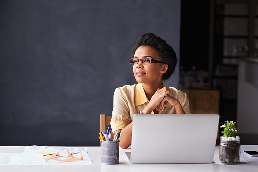 Cropped shot of a young businesswoman working on her laptop in the officehttp://195.154.178.81/DATA/i_collage/pu/shoots/806325.jpg