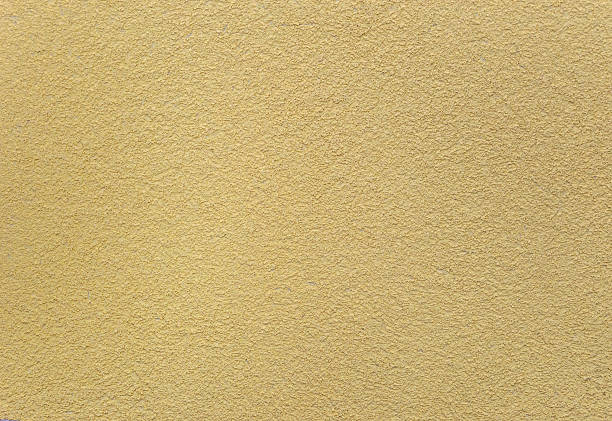 istock Yellow texture of plastered wall 509231334