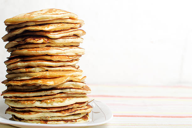 High stack of pancakes . Breakfast for the whole family stock photo