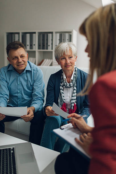 istock Mature Couple Meeting with Financial Advisor 509231524