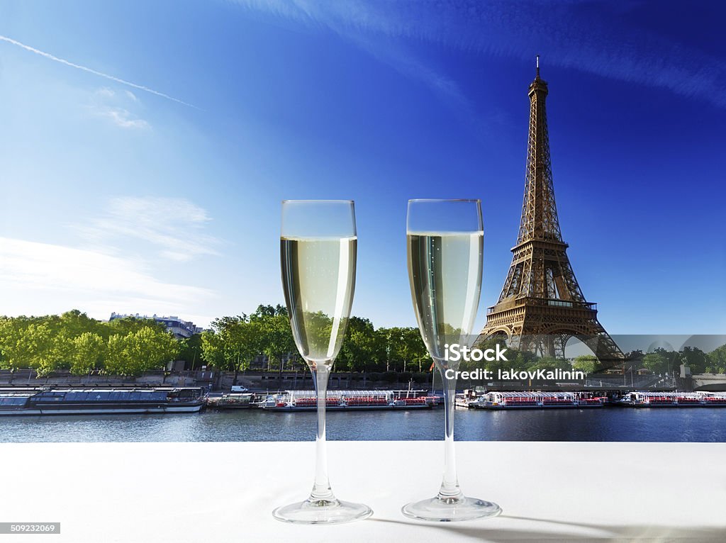 champaign Glasses and  Eiffel tower in Paris Eiffel Tower - Paris Stock Photo