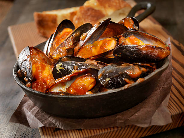 Mussels in Tomato Sauce with Fresh Parsley and Bread -Photographed on Hasselblad H3D2-39mb Camera