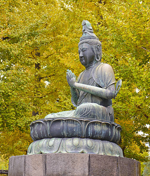 istock Buddha Statues with Gingko Trees in Autumn 509234567