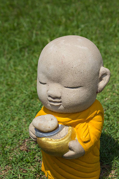 istock Earthenware of child monk 509236395