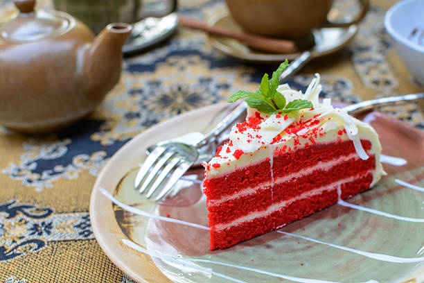 istock Red velvet cake with cup of tea and kettle 509240968