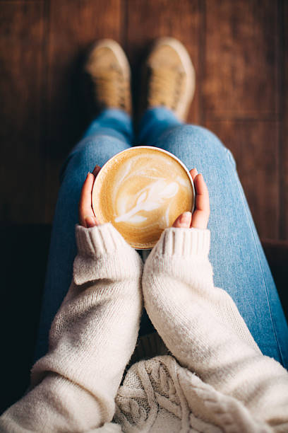 istock Girl's hands holding a cup of coffee 509241500