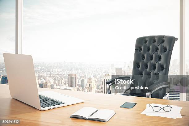 Workplace Of The Head With A Laptop And Stock Photo - Download Image Now - Office Chair, Office, Cityscape