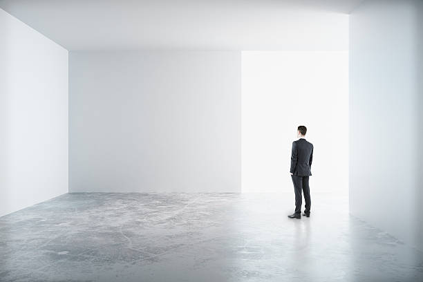 istock Man standing in a white room 509241760