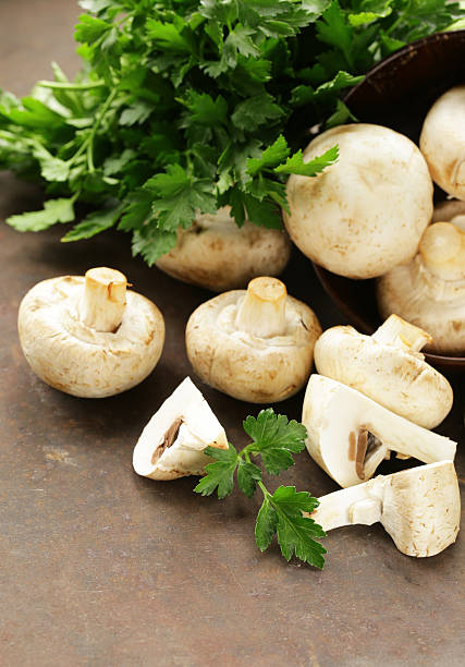 istock natural organic raw mushrooms champignons on table 509241802