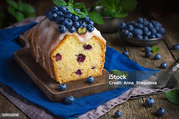 Blueberry Cake With Sugar Icing And Fresh Berries Stock Photo - Download Image Now - Baking, Berry Fruit, Blue