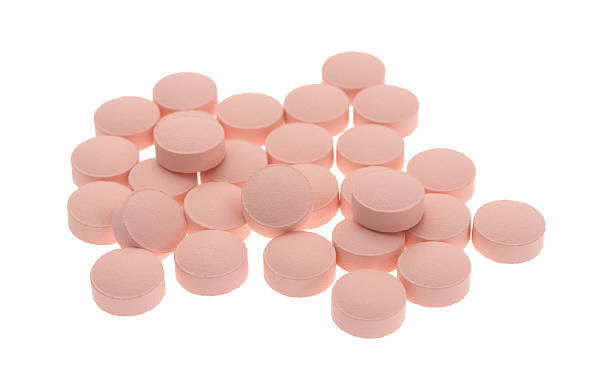 istock Famotidine pink tablets group on a white background 509245148