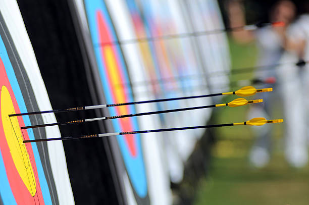 yellow arrows yellow headed arrows at target archery photos stock pictures, royalty-free photos & images