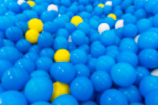 istock Many Blue and Yellow Ball in Ball pool Blurred 509247640