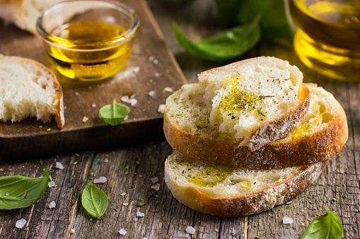 Italian ciabatta  bread with olive oil, selective focus