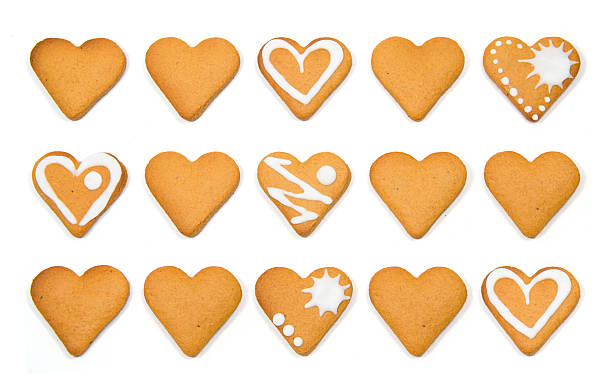 istock Heart shaped cookies pile isolated over white 509249978