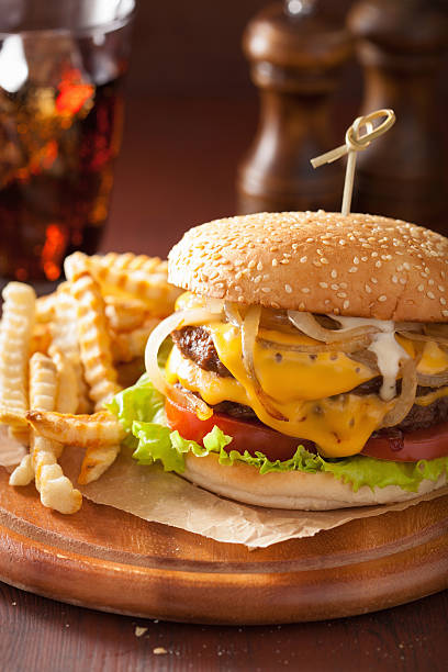 istock double cheeseburger with tomato and onion 509250362