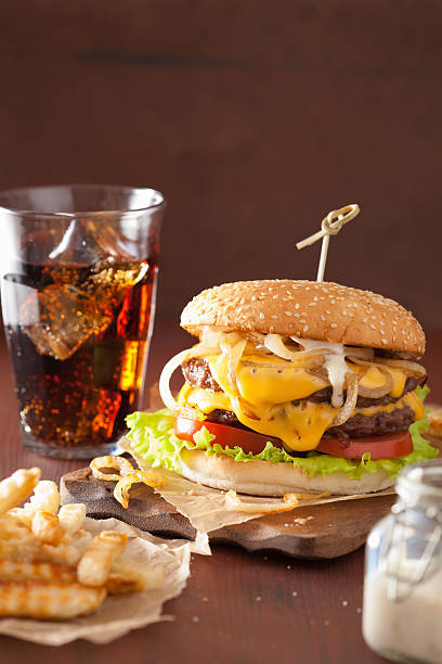 istock double cheeseburger with tomato and onion 509250518