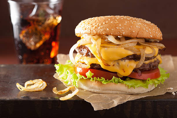 istock double cheeseburger with tomato and onion 509250782