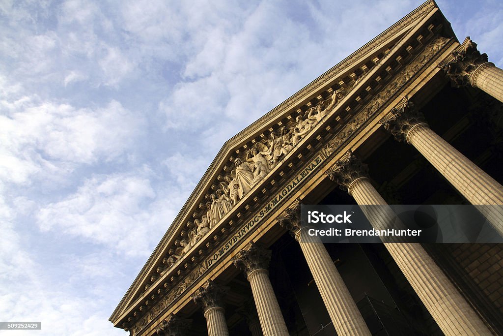 Temple and Sky Pillars of the L'église de la Madeleine in Paris. The Madeleine Church is a Catholic Chuch in the  8th arrondissement of Paris Antiquities Stock Photo